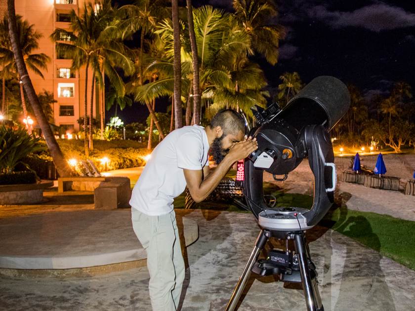 Jason peaking through the telescope.