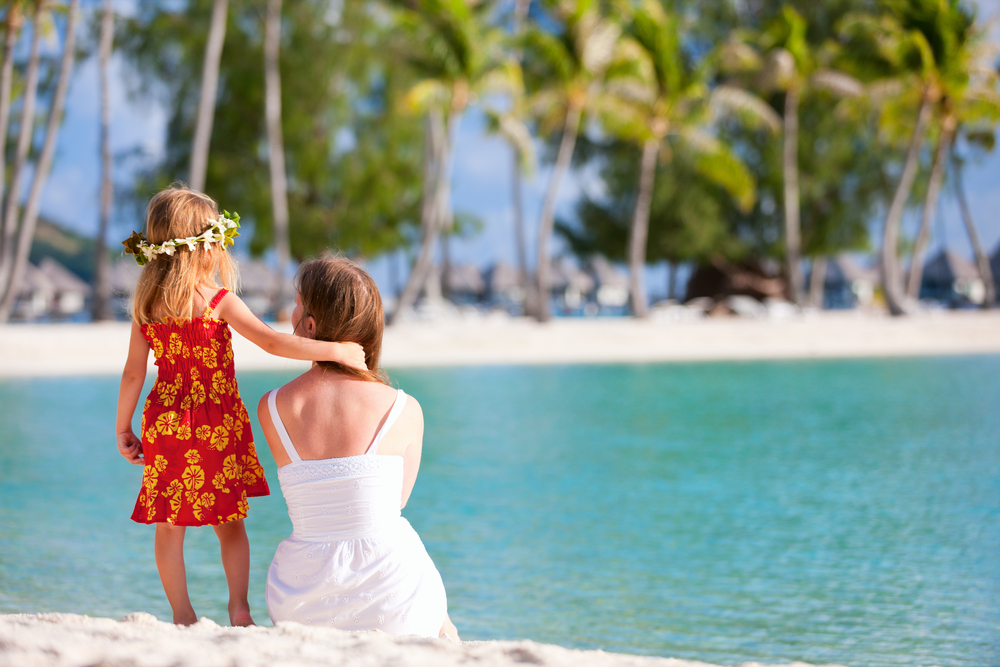 Mom an daughter by the beach