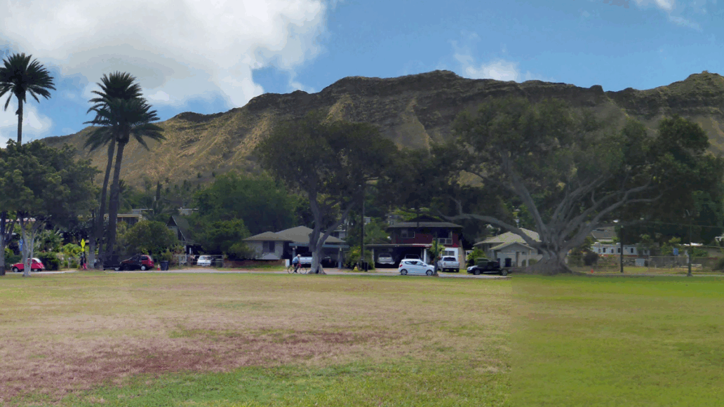 Kapiolani Park at during day with Diamond Head and clouds