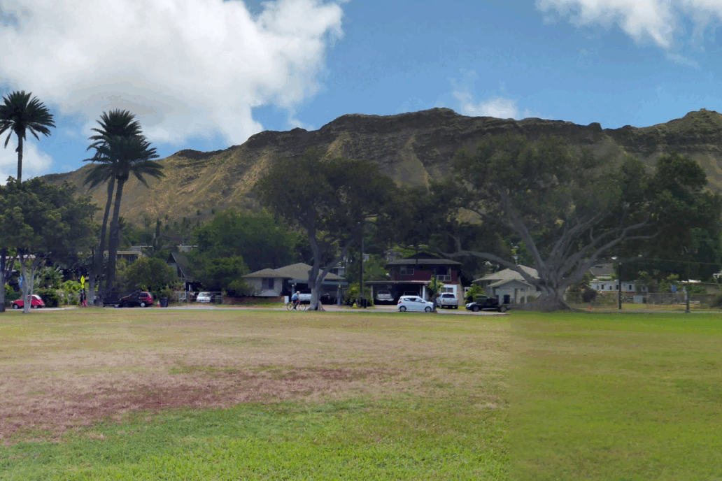 Kapiolani Park at during day with Diamond Head and clouds