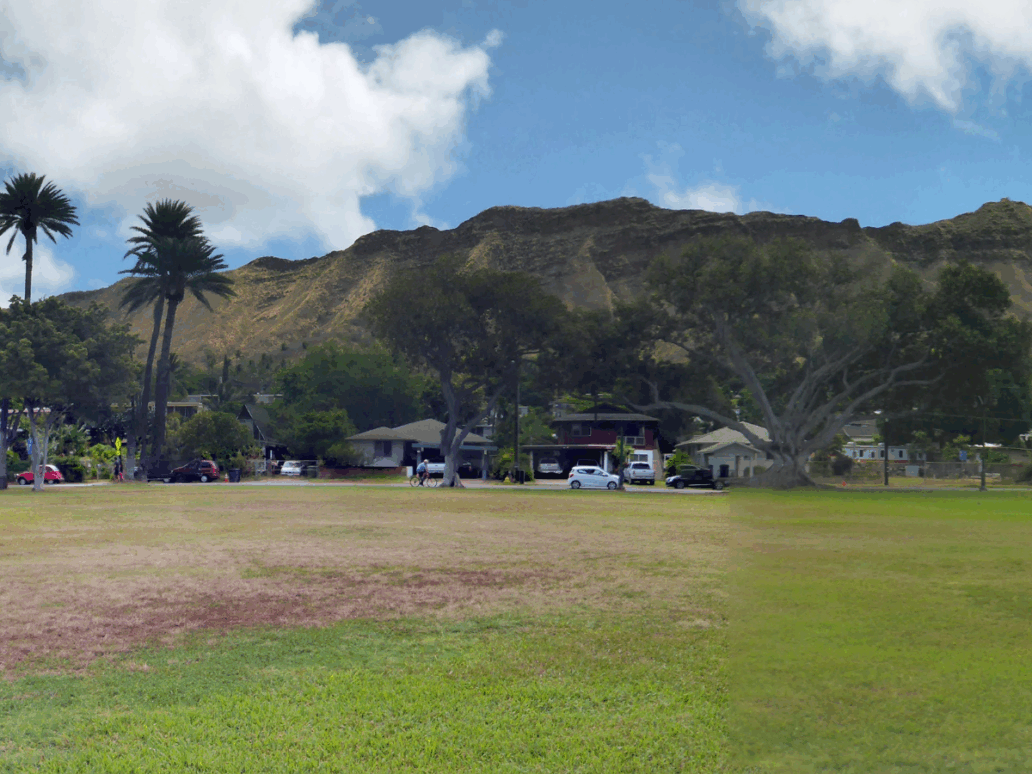 Kapiolani Park at during day with Diamond Head and clouds