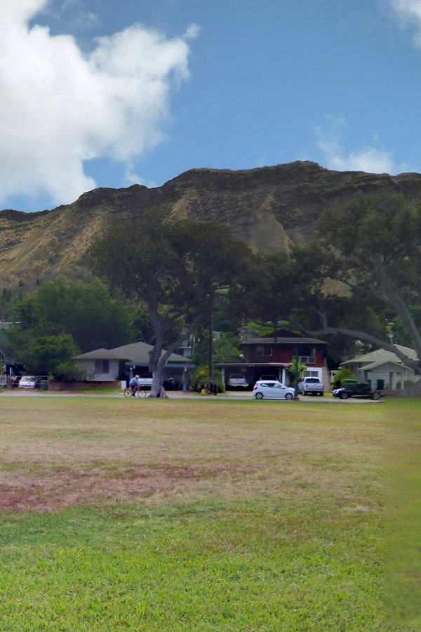 Kapiolani Park at during day with Diamond Head and clouds